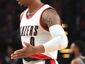 Portland Trail Blazers guard Damian Lillard is doubtful to play on Dec. 26, 2016 against the Toronto Raptors, but would provide an entertaining duel with Kyle Lowry if he does play. (STEVE DYKES/AP)