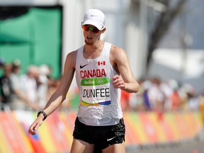 Evan Dunfee finished fourth in the men's 50-km race walk at the Summer Olympics in Rio de Janeiro, Brazil on Aug. 19, 2016. (AP Photo/Robert F. Bukaty)