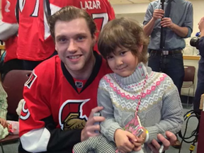 Nabila Lemke poses with Sens star Bobby Ryan at their second meeting at CHEO earlier this month.
