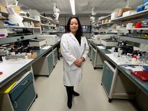 Dr. Elizabeth Brooks-Lim poses for a photo in the toxicology lab at the Medical Examiner's Office, 7007 - 116 St., in Edmonton on Monday Dec. 19, 2016. Photo by David Bloom