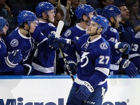 Tampa Bay Lightning left winger Jonathan Drouin celebrates with the bench after his goal against St. Louis Blues during an NHL game on Dec. 22, 2016. (AP Photo/Chris O'Meara)