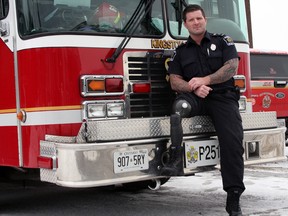 Firefighter Michael Laughlin at Kingston Fire and Rescue's station five on Railway Street in Kingston, Ont. on Thursday December 22, 2016. Steph Crosier/Kingston Whig-Standard/Postmedia Network