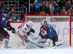 Same Bennett is stopped by Avalanche goalie Semyon Varlamov during a game in Denver last season. (Getty Images)