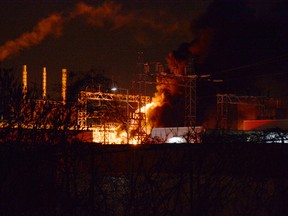 Firefighters respond to a fire at the National Research Council of Canada on Montreal Road in Ottawa on Tuesday, December 27, 2016