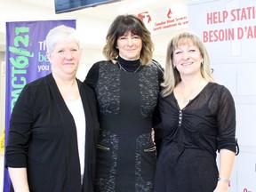 Jocelyn Philippe, Corrine Williamson and Lisa Jelley pose for a photo at the Sudbury Blood Donor Clinic, where they kicked off a drive Tuesday in honour of their children, Caitlin Jelley, Jazmine Houle and Steven Philippe, who were killed by an impaired driver in 2009. Ben Leeson/The Sudbury Star/Postmedia Network