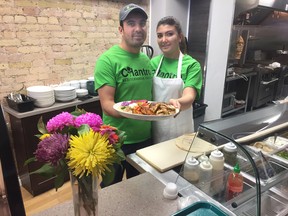 John and Mumtaz Ataee, operators of Cilantro Mediterranean Cuisine, show off their Middle Eastern fare, at the new eatery at 525 Richmond St. (HANK DANISZEWSKI, The London Free Press)