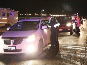 John Lappa/Sudbury Star
Vehicles are stopped along the Lasalle extension during the launch of Operation Red Nose and Reduce Impaired Driving Everywhere programon Nov. 25. The Operation Red Nose campaign continues throughout the month of December.