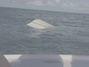 A photo Zack Sowder posted to Twitter after being rescued off the Florida Keys following a boat capsize. (@Sowdaaaa)