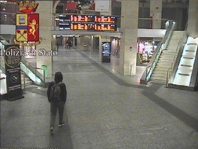 In this frame grab made available by the Italian police, Anis Amri, the main suspect in Berlin’s deadly Christmas market attack walks through the train station on Dec. 22. (Italian Police via AP)
