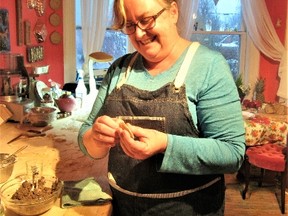 Carolyn Rundle in her colourful kitchen making mushroom vushka (dumplings). (Supplied photo)