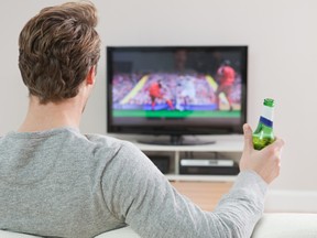 Columnist Ben McLean vows not drink booze in January, even when he's watching sports on television. (Getty Images)