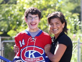 Viktoria Koganova and her son Daniel Salganov, a player on the Kingston Canadians special needs hockey team. (Ian MacAlpine/The Whig-Standard)
