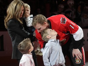 Daniel Alfredsson, his wife Bibbi and three of their sons celebrate the ex-Senators captain 1,000th game in the NHL in 2010. (Jean Levac, Postmedia Network)