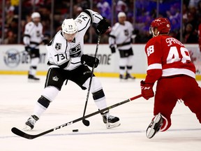 Tyler Toffoli of the Los Angeles Kings makes a move around Ryan Sproul of the Detroit Red Wings and goes on to score a open net third period goal at Joe Louis Arena on Dec. 15, 2016. (Gregory Shamus/Getty Images)