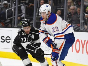 Leon Draisaitl battles Kings' Jeff Carter behind the net during a game in November in Los Angeles. (AP Photo)