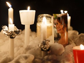 Friends and family members of Rachael Longridge, a nurse killed on Dec. 23, held a candlelight vigil outside of the Edmonton Clinic Health Academy at the University of Alberta in Edmonton, Alberta on Wednesday, December 28, 2016. Ian Kucerak / Postmedia