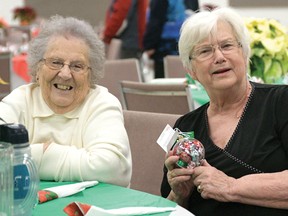 Donna Biro (left) and Anne Cox volunteered at The Salvation Army's Feast of Friends on Dec. 25th at North Broadway Baptist Church in Tillsonburg. About 75-80 people attended the 2-4 p.m. 9th annual Friendship Feast. (CHRIS ABBOTT/TILLSONBURG NEWS)
