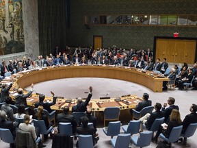 In this photo provided by the United Nations, members of the United Nations Security council vote at the United Nations headquarters on Friday, Dec. 23, 2016, in favor of condemning Israel for its practice of establishing settlements in the West Bank and east Jerusalem. In a striking rupture with past practice, the U.S. allowed the vote, not exercising its veto. (Manuel Elias/The United Nations via AP)