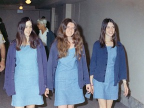 Charles Manson followers, from left: Susan Atkins, Patricia Krenwinkel and Leslie Van Houten, shown walking to court to appear for their roles in the 1969 cult killings of seven people, including pregnant actress Sharon Tate, in Los Angeles, Calif., in this Aug. 20, 1970 file photo. (AP Photo/George Brich, File)