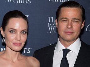 Angelina Jolie Pitt and Brad Pitt attend the WSJ Magazine Innovator Awards 2015 at The Museum of Modern Art in New York. (Charles Sykes/Invision/AP, File)