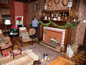 Susan Butlin decorates Eldon House in London. (DEREK RUTTAN, The London Free Press)