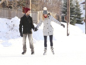 In this file photo, a couple takes a spin around the skating oval at Queen's Athletic Field in Sudbury's west end. The oval will be open on Feb. 19 for Family Day.