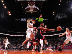 Kyle Lowry of the Toronto Raptors passes the ball during a game against the Phoenix Suns on Dec. 29, 2016 at Talking Stick Resort Arena in Phoenix, Arizona. (Barry Gossage/NBAE via Getty Images)