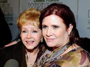 Actresses Debbie Reynolds and Carrie Fisher arrive at the premiere of the HBO documentary “Wishful Drinking” at Linwood Dunn Theater at the Pickford Center for Motion Study on December 7, 2010 in Hollywood. (Kevork Djansezian/Getty Images)