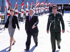 This May, 25, 2016 photo released by Brazil's presidential press office shows Greece's ambassador to Brazil, Kyriakos Amiridis, center, after a government ceremony in Brasilia, Brazil. Authorities believe Amiridis was killed at the home his wife kept in the Rio de Janeiro area after he went missing on Monday, a police investigator said Friday, Dec. 30, 2016. (Marcos Correa/Brazil's presidential press office via AP)