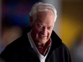 Gordie Howe watches the Vancouver Canucks and San Jose Sharks play during an NHL hockey game in Vancouver, B.C., on November 14, 2013. Howe was among the notable Canadians who died in 2016. THE CANADIAN PRESS/Darryl Dyck