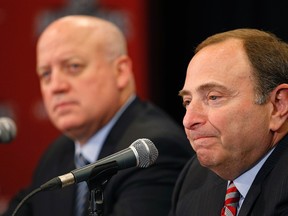 NHL Commissioner Gary Bettman (right) and Deputy Commissioner Bill Daly (left) are still looking for a reason to send players to the 2018 Olympics in South Korea. (John Locher/AP Photo/Files)