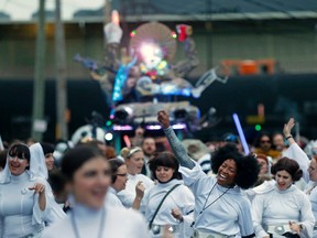 Members of the Krewe of Chewbacchus, a Mardi Gras Krewe, hold a parade with members dressed as Princess Leia, in honour of actress Carrie Fisher, who played Leia in the "Star Wars" movie series, in New Orleans, Friday, Dec. 30, 2016. Fisher died on Dec. 27, 2016, at the age of 60. (AP Photo/Gerald Herbert)