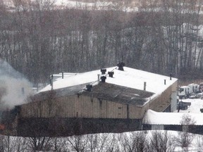 City of Greater Sudbury Fire Services are on the scene of a large fire at Sudbury Truck and Trailer on Whissell Avenue in Sudbury, Ont. on Saturday December 31, 2016. Residents in the immediate area and in the vicinity of the smoke are asked to go indoors, close all doors and windows and turn of any air intakes due to heavy smoke from the fire.Other residents and motorists are asked to stay away from the area if possible while crews are working to extinguish the fire. Gino Donato/Sudbury Star/Postmedia Network