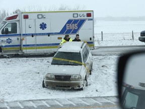 Emergency crews respond to cars hitting the ditch off Highway 2, south of Leduc. (Ian Kucerak)