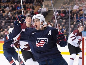 The United States' Colin White (18) reacts after scoring during second period world junior hockey championship action against Latvia in Toronto on Monday,, Dec. 26, 2016. (Nathan Denette/The Canadian Press)