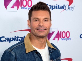 In this Dec. 9, 2016 file photo, Ryan Seacrest attends Z100's iHeartRadio Jingle Ball at Madison Square Garden in New York. Seacrest says he and about five other people got stuck in a Times Square elevator before an appearance on ABC's "Good Morning America" and were rescued by firefighters. (Charles Sykes/Invision/AP, File)