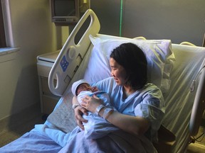 Long Zhu Wang is pictured with her son, Allan. (SUPPLIED PHOTO)