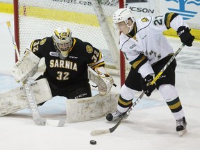 ondon Knights forward Robert Thomas finds the puck alone in front of Sarnia Sting goalie Justin Fazio during the Ontario Hockey League game at Progressive Auto Sales Arena on Sunday, Jan. 1, 2017 in Sarnia, Ont. The teams concluded their annual new year home-and-home series. Terry Bridge/Sarnia Observer/Postmedia Network