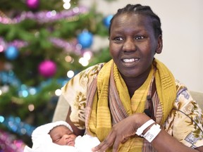 The baby girl, named Joy, was born at 12:01 a.m. at the Lois Hole Hospital for Women to Edmonton mom Nyadin Nyoak and dad Lol Duop. SHAUGHN BUTTS/Postmedia
