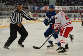 January 01, 2017: Toronto Maple Leafs left wing Matt Martin (15) fights  Detroit Red Wings center Steve Ott (29) along the benches during the 2017  Scotiabank NHL Centennial Classic between The Toronto