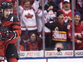 Canada forward Matt Barzal celebrates with defenceman Thomas Chabot after Chabot scored against the United States during second period IIHF World Junior Championship hockey action in Toronto on Saturday, Dec. 31, 2016. (THE CANADIAN PRESS/Nathan Denette)