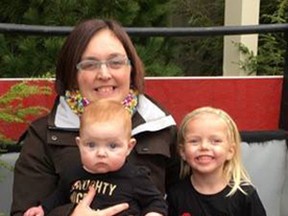 Sarnia mother Bevin Perdu is pictured here with her daughters Zuri, 9 months, and Alora, 4. Perdu is launching a playgroup at Vision Nursing Home to bring children and seniors together. (Handout/Sarnia Observer/Postmedia Network)
