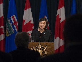Shannon Phillips, Minister Responsible for the Climate Change Office,  provided an overview of the levy, levy rebates at the Alberta Legislature on January 1, 2017.  Photo by Shaughn Butts/Postmedia