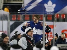 Toronto Maple Leafs forward Matt Martin chirps Detroit Red Wings forward Steve Ott from the penalty box after a fight during the Centennial Classic in Toronto on Jan. 1, 2017. (Jack Boland/Toronto Sun/Postmedia Network)