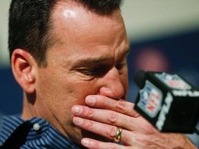 Gary Kubiak reacts at a news conference as he steps down as head coach of the Denver Broncos because of health concerns on Jan. 2, 2017. (AP Photo/David Zalubowski)
