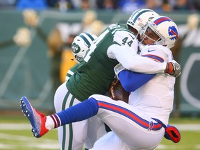 Corey Lemonier of the New York Jets sacks EJ Manuel of the Buffalo Bills during the second half at MetLife Stadium on Jan. 1, 2017. (Ed Mulholland/Getty Images)