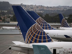 United Airlines planes sit on the tarmac at San Francisco International Airport in San Francisco, Calif., in this July 8, 2015 file photo. (Justin Sullivan/Getty Images)