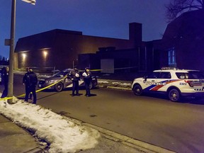 Toronto Police investigate a shooting outside a building at Mt. Olive Dr. and Kipling Ave. on Jan. 2, 2016. (Victor Biro/Special to the Toronto Sun)