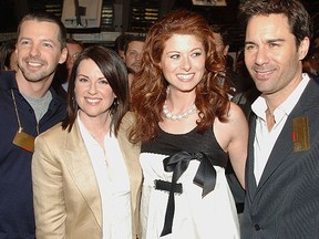 Sean Hayes, Megan Mullally, Debra Messing, and Eric McCormack from the Cast of 'Will and Grace' walk on the floor of the New York Stock Exchange on May 18, 2006 in New York City. (Photo by Brad Barket/Getty Images)
