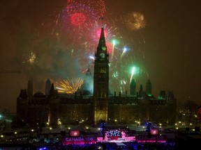 Fireworks explode over Parliament Hill to celebrate New Year's Eve and Canada's 150th anniversary of Confederation on Parliament Hill. Canadian Press